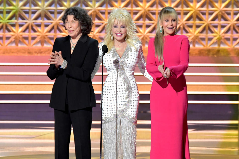 Actors Lily Tomlin, Dolly Parton, and Jane Fonda speak onstage during the 69th Annual Primetime Emmy Awards at Microsoft Theater on Sept. 17, 2017 in Los Angeles, California.&nbsp;