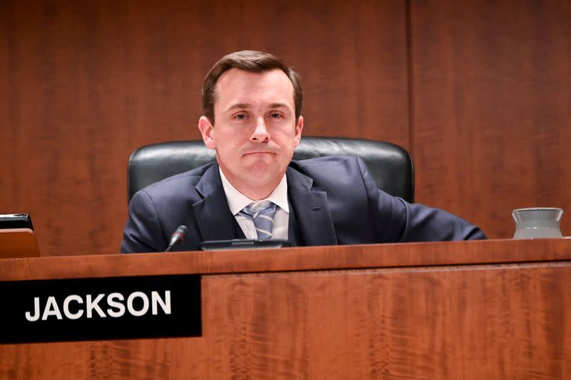 FILE PHOTO: Commissioner Jackson participates in a U.S Securities and Exchange Commission open meeting to propose changing its definition of an "accredited investor" in Washington