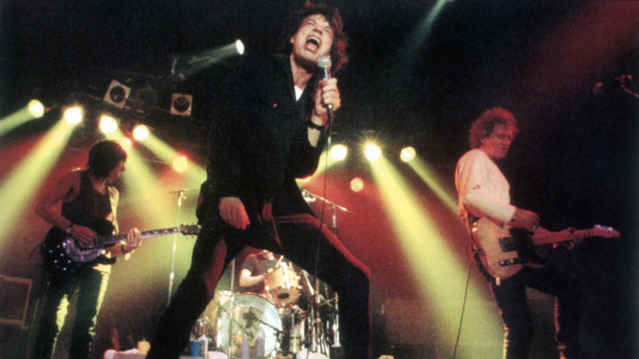 Mick Jagger Mick Jagger, foreground, Keith Richards, right, Ron Wood, left, and Charlie Watts, at drums, of the Rolling Stones belt out a song during a preview concert for their "Voodoo Lounge" tour at RPM night club in Toronto, CanadaThe Rolling Stones, Toronto, Canada.