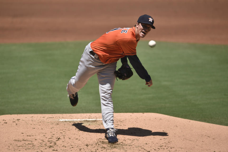 Houston Astros starting pitcher Zack Greinke delivers a pitch during the first inning of a baseball game against the San Diego Padres in San Diego, Sunday, Aug. 23, 2020. (AP Photo/Kelvin Kuo)