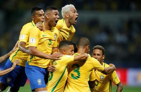 Soccer Football - 2018 World Cup Qualifications - South America - Brazil v Chile - Allianz Parque stadium, Sao Paulo, Brazil - October 10, 2017 Players of Brazil celebrate their first goal. REUTERS/Leonardo Benassatto