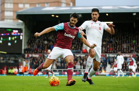 Football Soccer - West Ham United v Liverpool - Barclays Premier League - Upton Park - 2/1/16 Liverpool's Emre Can in action with West Ham's James Tomkins Action Images via Reuters / John Sibley Livepic