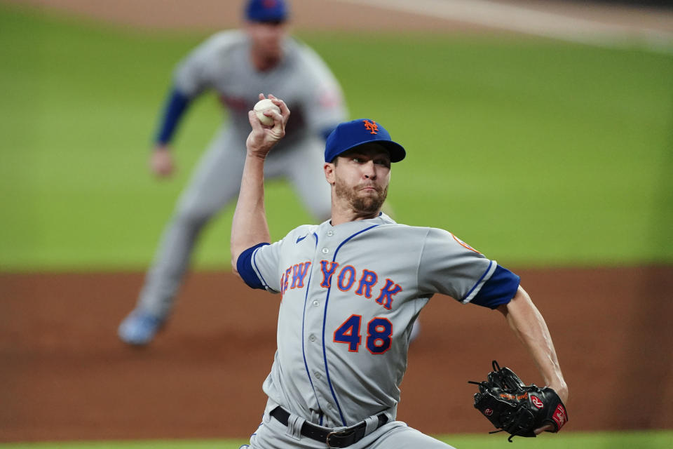 New York Mets starting pitcher Jacob deGrom (48) delivers in the first inning of the team's baseball game against the Atlanta Braves on Friday, Sept. 30, 2022, in Atlanta. (AP Photo/John Bazemore)