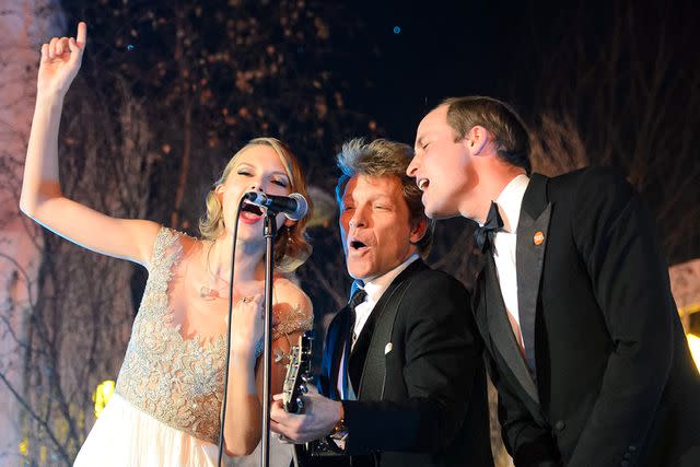 <p>Dominic Lipinski/AFP via Getty</p> From left: Taylor Swift, Jon Bon Jovi and Prince William perform at a charity event on Nov. 26, 2013