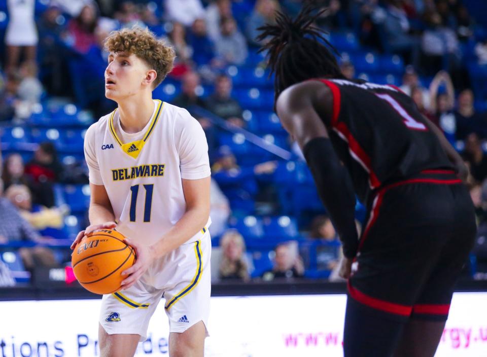 Delaware's Cavan Reilly goes to the line with six seconds left in the second half of Delaware's 81-78 win at the Bob Carpenter Center, Saturday, Jan. 28, 2023. Reilly hit both his shots to give the Hens the eventual final winning margin.