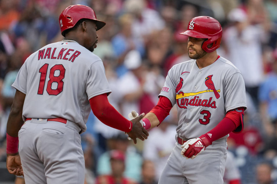 St. Louis Cardinals' Jordan Walker, left, and Dylan Carlson celebrate Carlson's two-run home run against the Washington National during the second inning of a baseball game at Nationals Park, Tuesday, June 20, 2023, in Washington. (AP Photo/Alex Brandon)