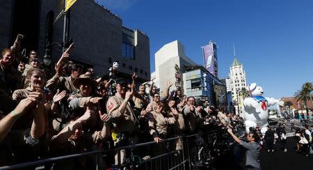 Fans wait at the premiere of the film "Ghostbusters" in Hollywood, California U.S., July 9, 2016. REUTERS/Mario Anzuoni