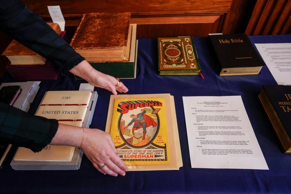 A first edition Superman comic from 1939 is placed with copies of the Constitution and a variety of other texts to be used in congressional swearing-in ceremonies. (AP)