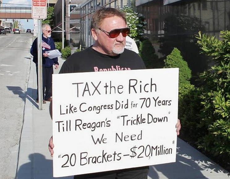 In this undated file photo, James Hodgkinson holds a sign during a protest outside of a United States Post Office in Belleville, Ill. Hodgkinson has been identified as the suspect in the Wednesday, June 14, 2017, Washington D.C. shooting. (Photo: Derik Holtmann/Belleville News-Democrat via AP)
