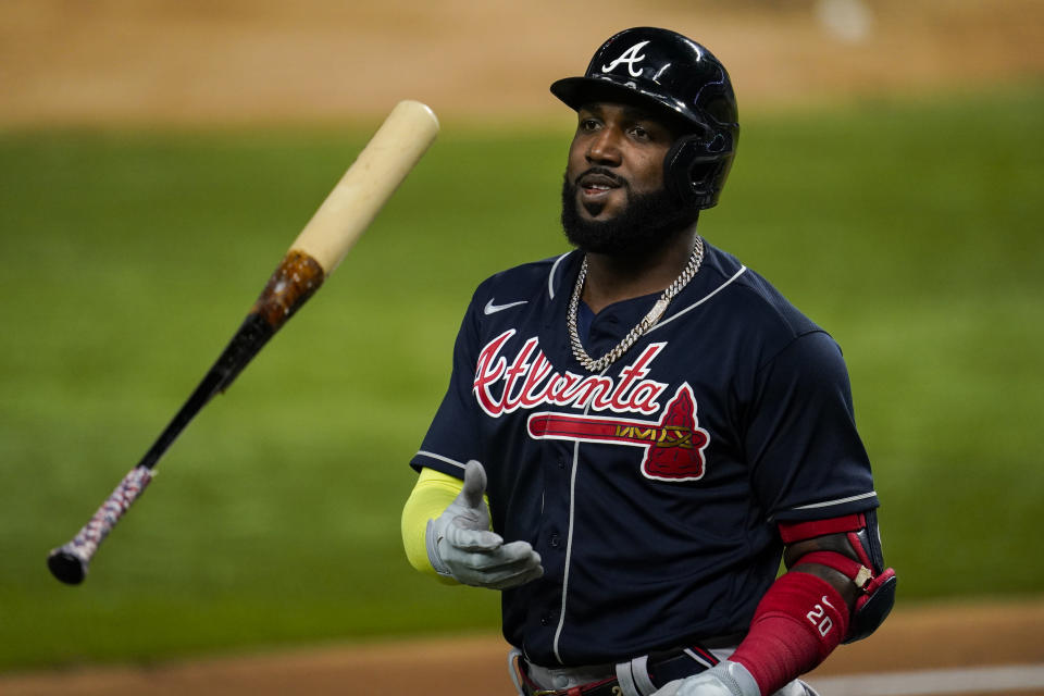 ARLINGTON, TX - OCTOBER 18:  Marcell Ozuna #20 of the Atlanta Braves walks to the dugout after being robbed of a home run during Game 7 of the NLCS between the Atlanta Braves and the Los Angeles Dodgers at Globe Life Field on Sunday, October 18, 2020 in Arlington, Texas. (Photo by Cooper Neill/MLB Photos via Getty Images)