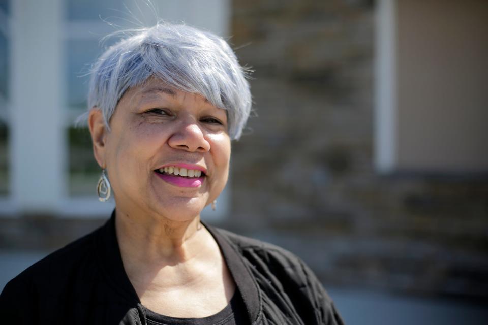 Renee Ross, 69, of Silverton, poses in front of the Corinthian Baptist Church in the Bond Hill neighborhood of Cincinnati on Wednesday, April 22, 2020. Ross recently joined in a voter drive led by the church, and believes vote-by-mail should be implemented permanently. 