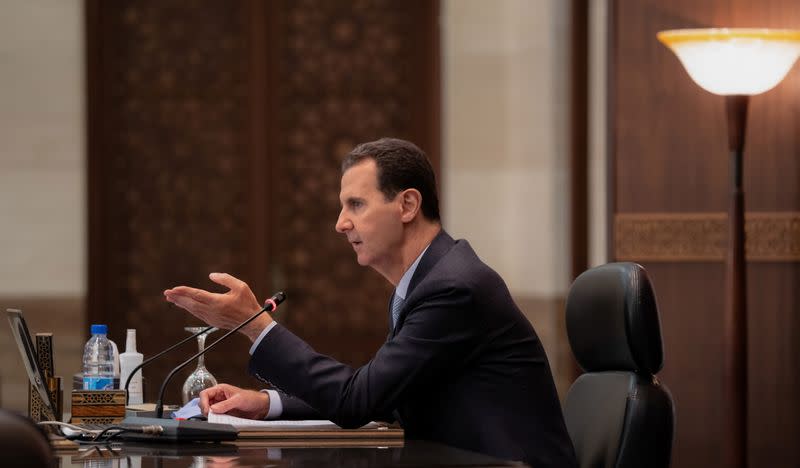 Syria's President Bashar al-Assad meets with the Syrian cabinet in Damascus