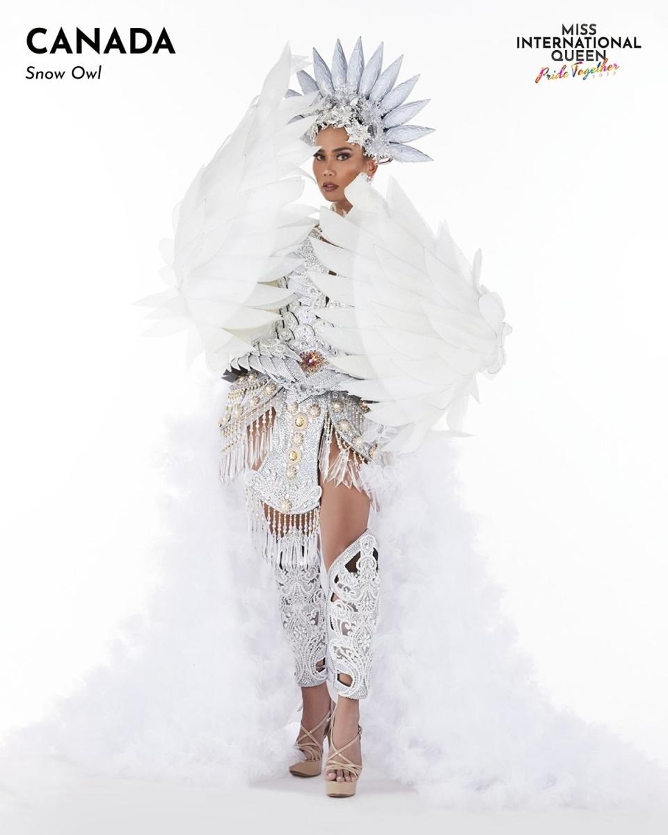 Miss Canada wears white in a snow owl-themed outfit