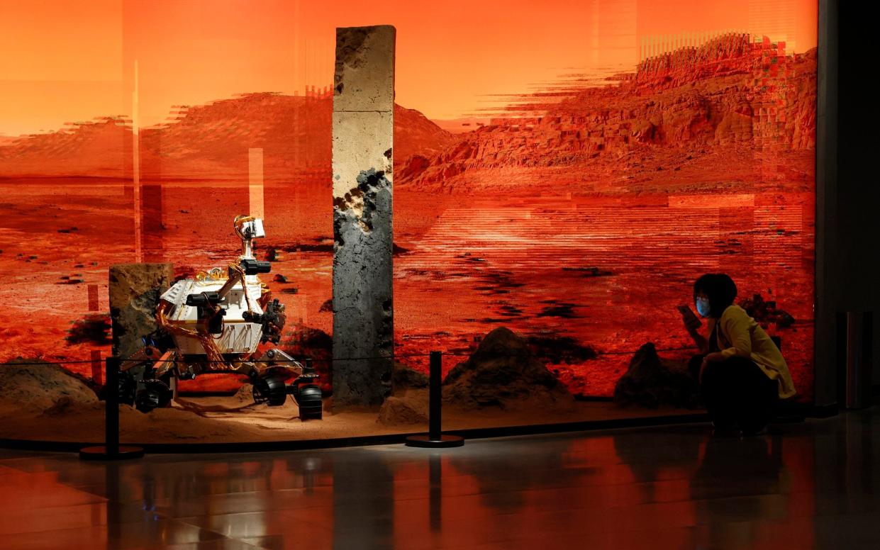 An exhibition depicting a rover in Mars in Beijing - AP