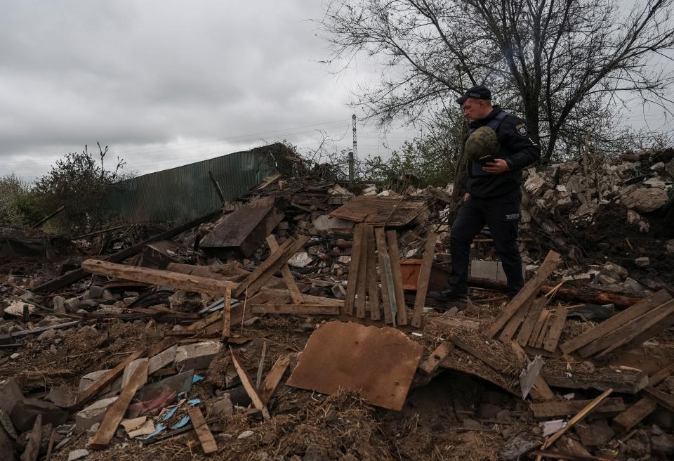 FILE-A police officer is seen at the site of a residential area hit by a Russian military strike, amid Russia’s attack on Ukraine’s Dnipropetrovsk region (REUTERS)