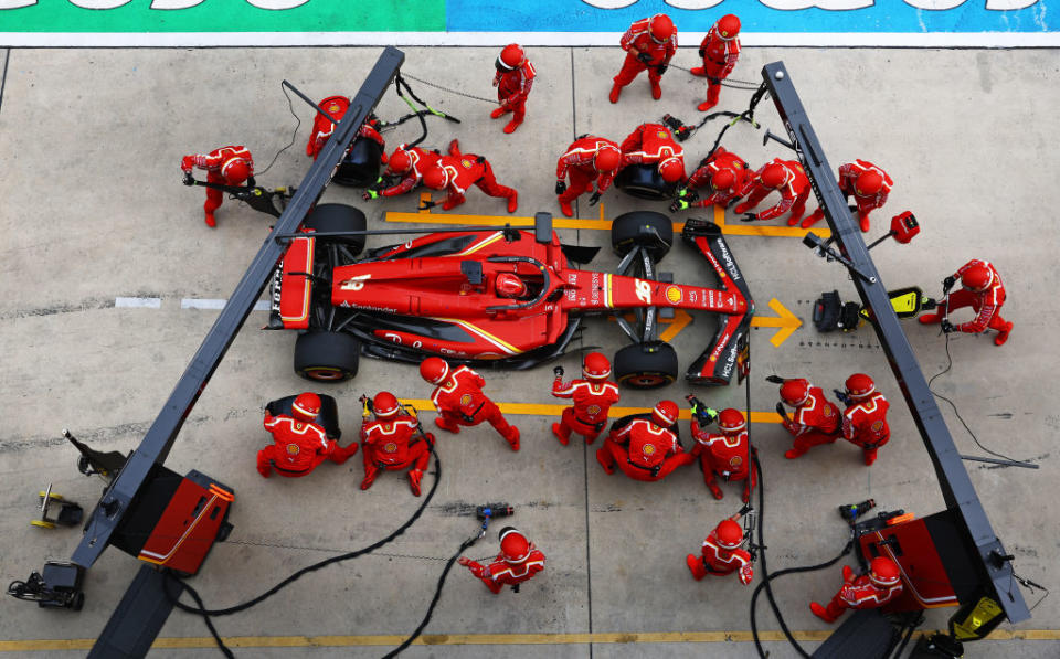 SHANGHAI, CHINA - APRIL 21: Charles Leclerc of Monaco driving the (16) Ferrari SF-24 makes a pitstop during the F1 Grand Prix of China at Shanghai International Circuit on April 21, 2024 in Shanghai, China. (Photo by Mark Thompson/Getty Images)