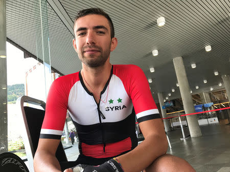 Cyclist Badreddin Ahmad Wais of Syria poses for a picture after competing in the individual time trial race at the UCI Road World Championships in Bergen, Norway, September 20, 2017. REUTERS/Julien Pretot