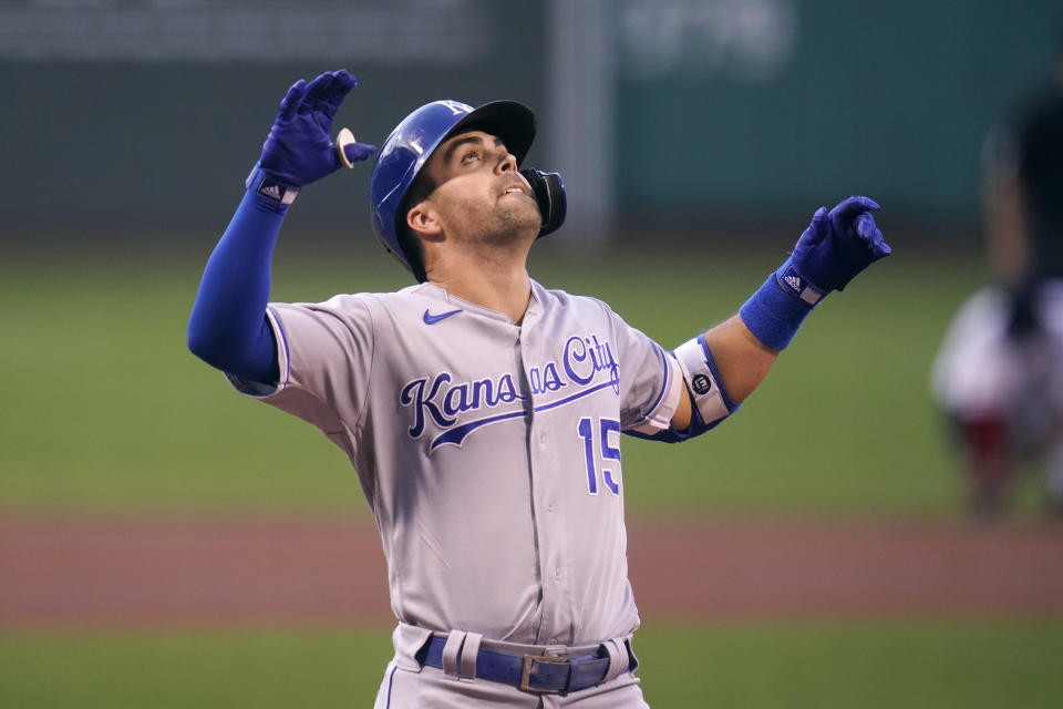 Kansas City Royals' Whit Merrifield celebrates his solo home run off Boston Red Sox starting pitcher Nick Pivetta during the first inning of a baseball game at Fenway Park, Tuesday, June 29, 2021, in Boston. (AP Photo/Charles Krupa)