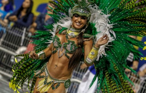 A "Unidos de Vila Maria" samba school dancer performs early Sunday during the second night of carnival in Sao Paulo, Brazil