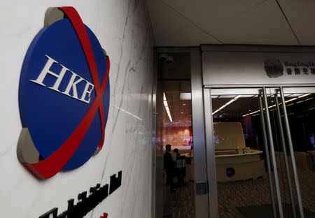 A Hong Kong Exchange logo is displayed outside one of the building's entrances in Hong Kong, China June 26, 2015. REUTERS/Bobby Yip