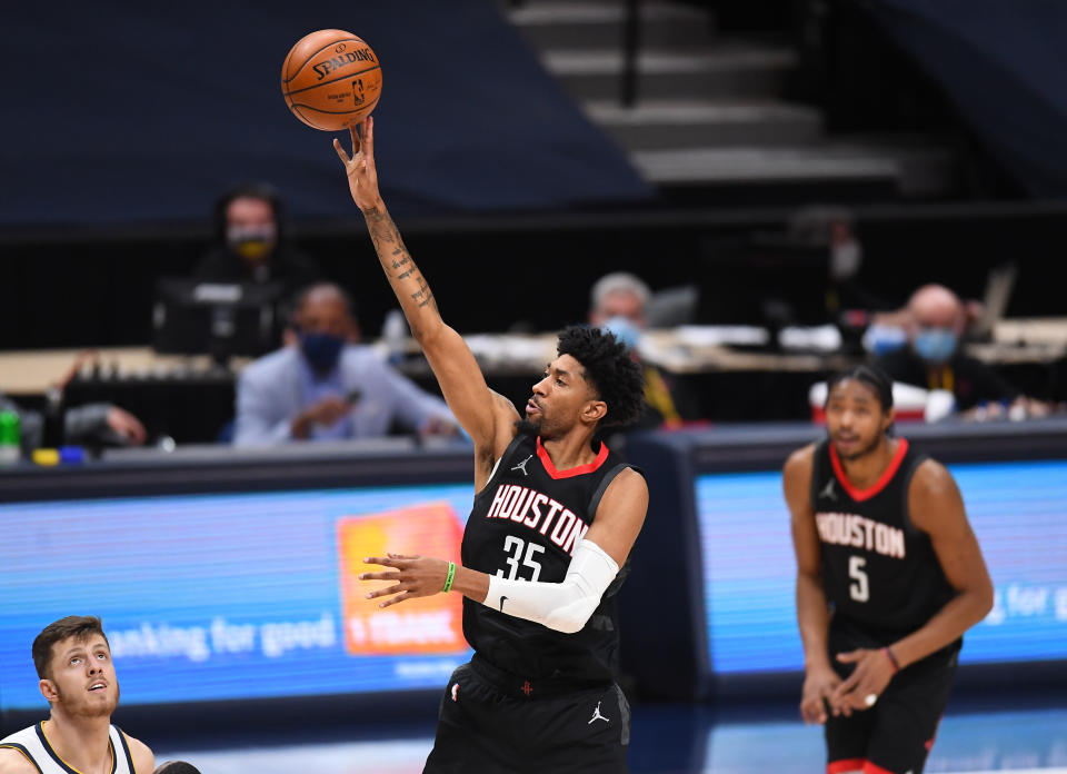 Dec 28, 2020; Denver, Colorado, USA; Houston Rockets forward Christian Wood (35) shoots the ball in the fourth quarter against the Denver Nuggets at Ball Arena. 