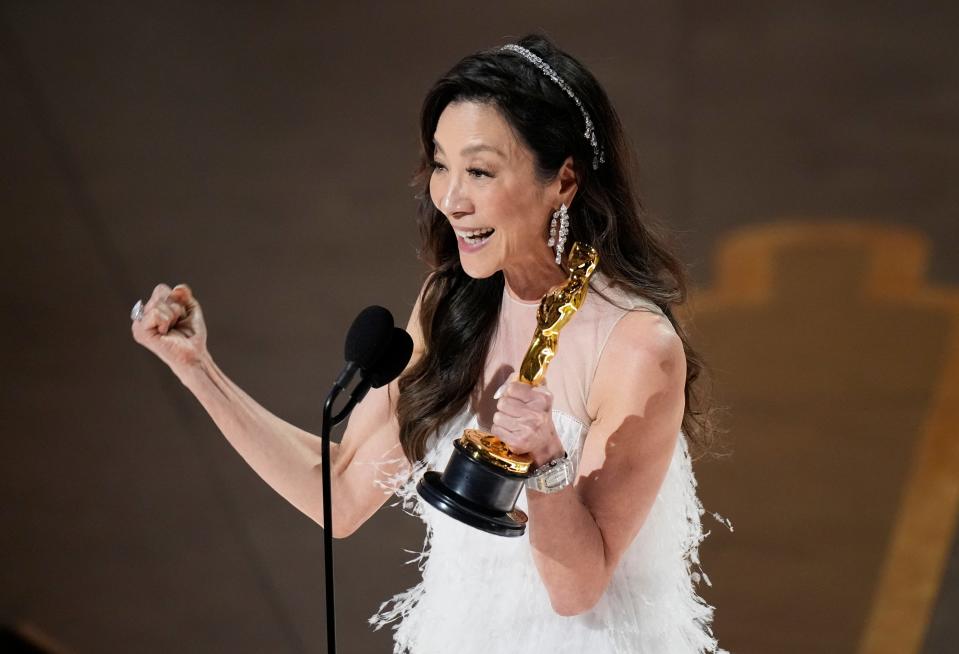 Michelle Yeoh accepts the award for best actress in a leading role for her performance in "Everything Everywhere All at Once."