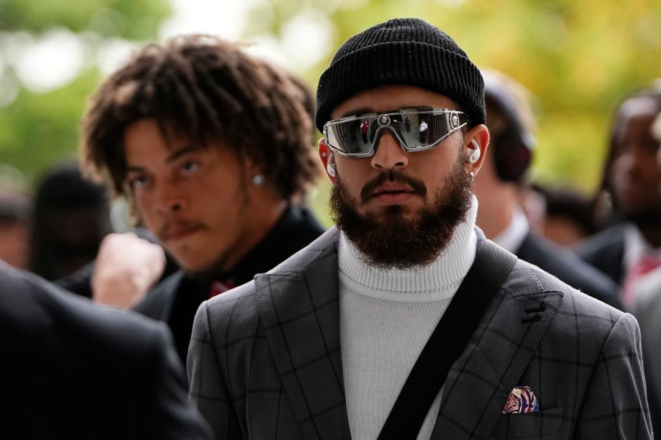 Ohio State receiver Julian Fleming walks into Ohio Stadium for a game against Western Kentucky.