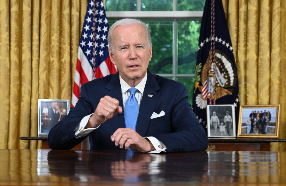 President Joe Biden addresses the nation on averting default and the Bipartisan Budget Agreement in the Oval Office on Friday.