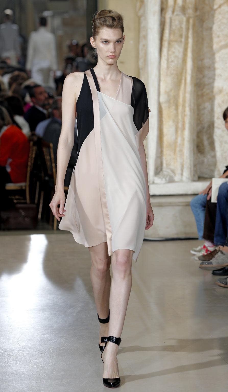 A model wears a creation by fashion designer Bouchra Jarrar during her Women's Fall Winter 2013-2014 haute couture fashion collection presented at Antoine Bourdelle Museum in Paris Tuesday, July 2, 2013 in Paris. (AP Photo/Jacques Brinon)