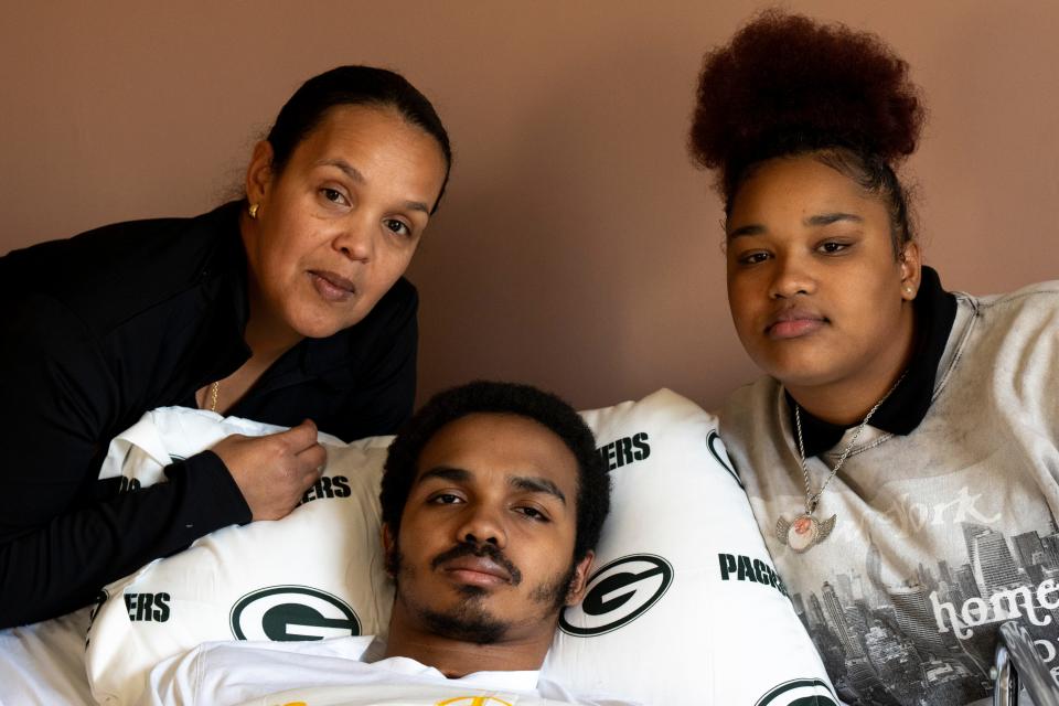 Valerie Whittle, 43, with her children, Simeon Whittle, 20, and Sydnee Whittle, 17, at their home in West Price Hill on Tuesday, Nov. 14, 2023.