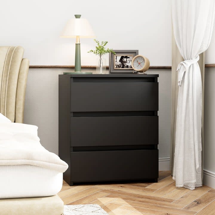 A three drawer nightstand