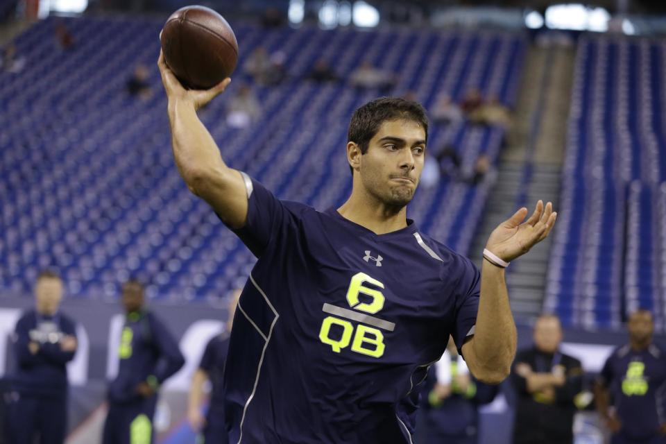 Eastern Illinois quarterback Jimmy Garoppolo throws during a drill at the NFL football scouting combine in Indianapolis, Sunday, Feb. 23, 2014. (AP Photo/Michael Conroy)