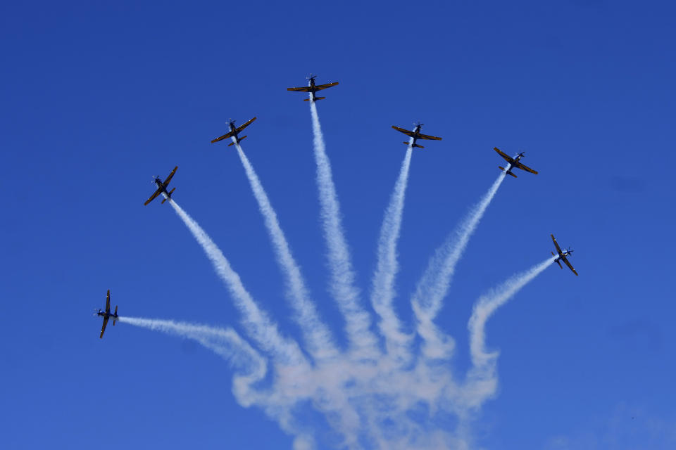 Aircrafts from the Esquadrilha da Fumaca, or Smoke Squadron, fly over a military parade on Independence Day in Brasilia, Brazil, Thursday, Sept. 7, 2023. (AP Photo/Eraldo Peres)