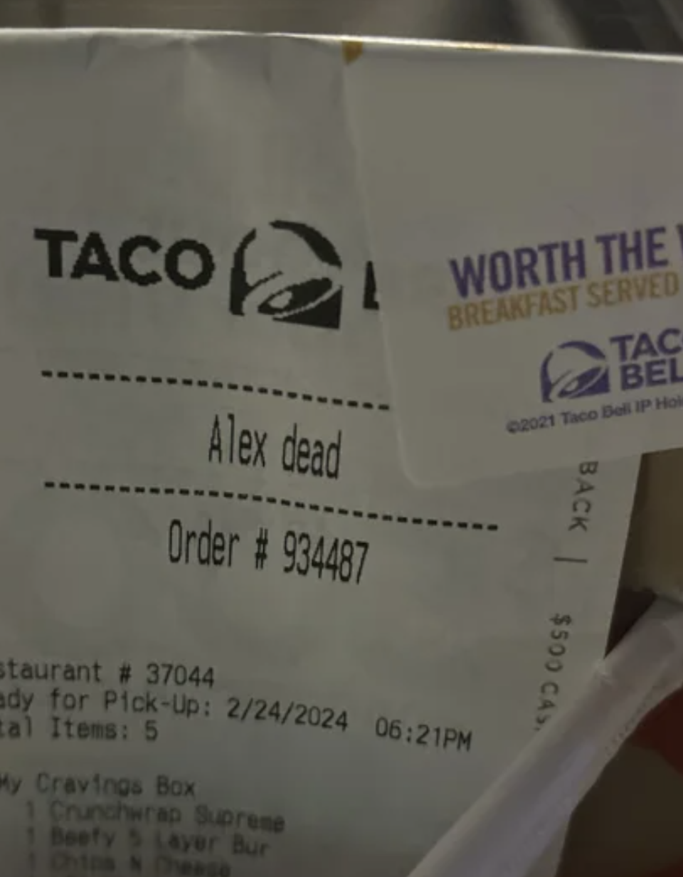 Receipt with a handwritten note saying "Alex dead" under the name section
