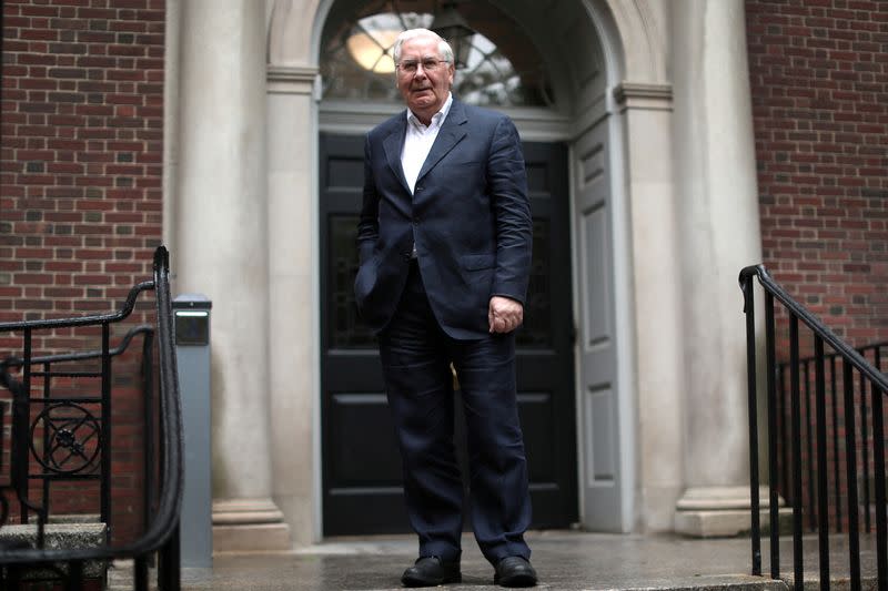 FILE PHOTO: Mervyn King poses for a photograph at New York University