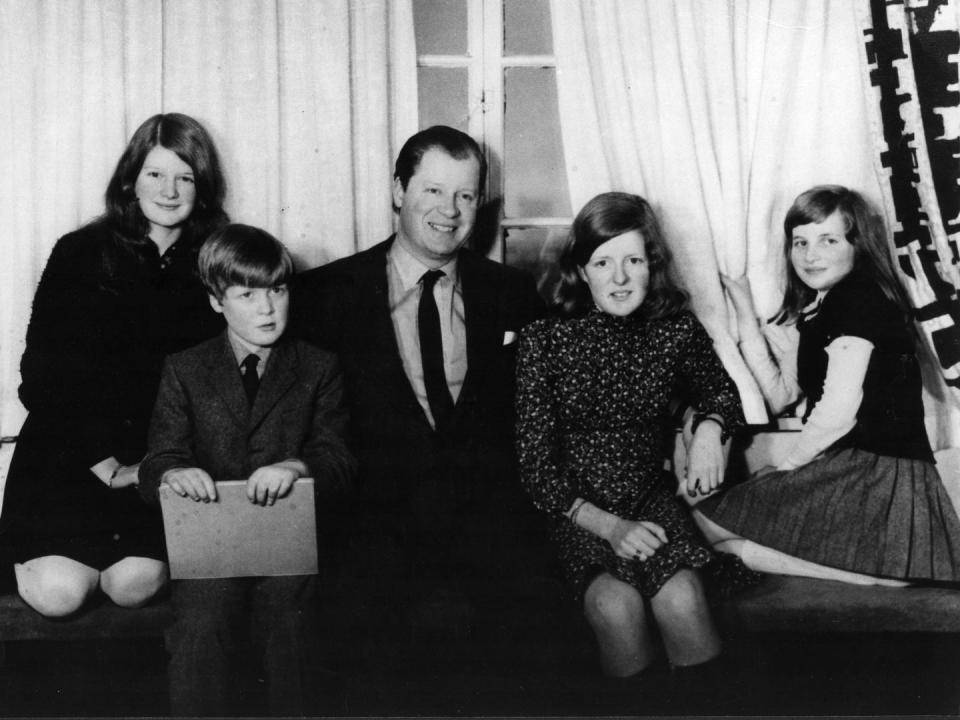 <p>Diana, her siblings, and her father pose for a photograph at home. The family moved to the Spencer estate after Diana's grandfather died, making her father the eighth Earl Spencer. </p>