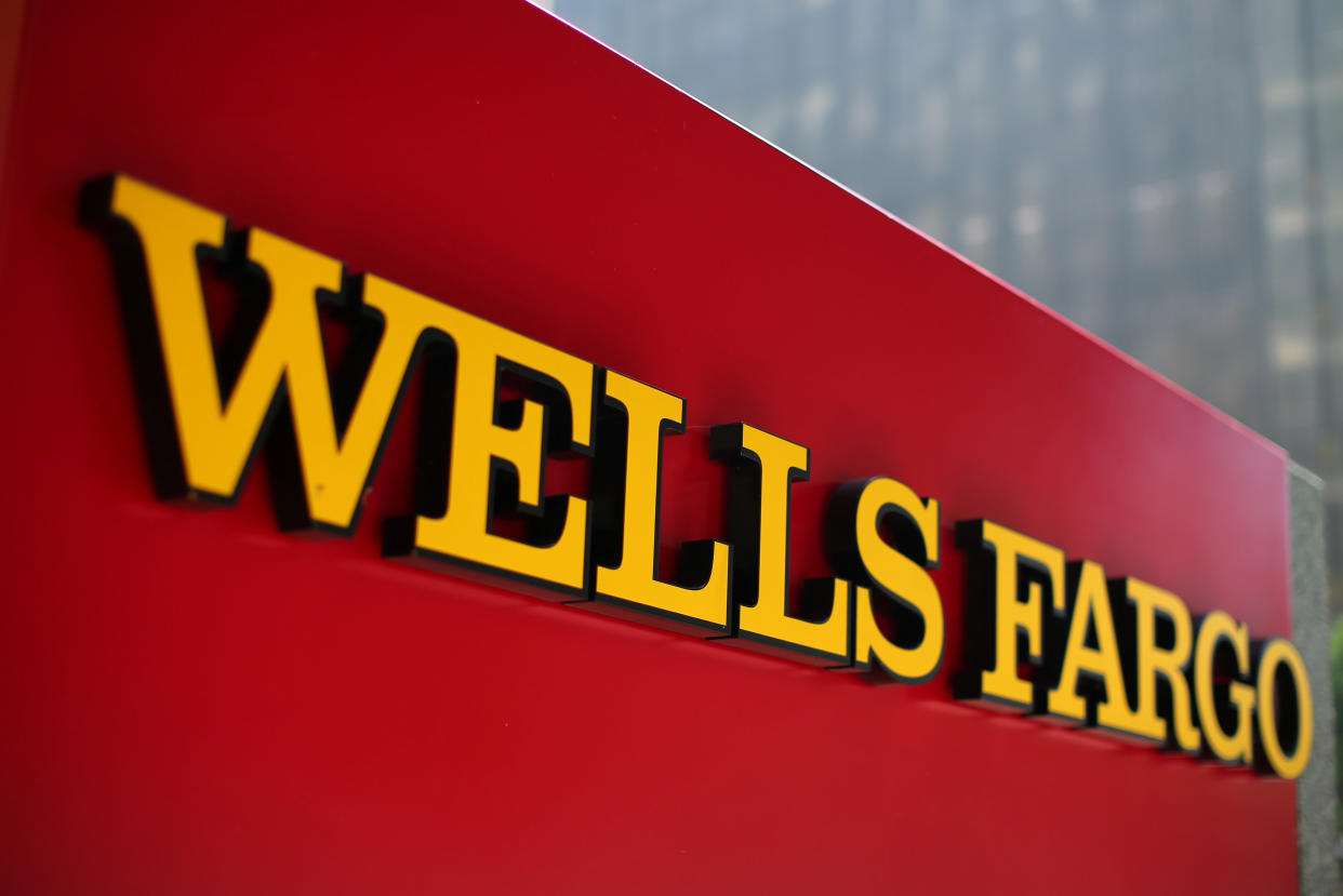 A Wells Fargo bank sign is pictured in downtown Los Angeles, California, U.S. August 10, 2017. REUTERS/Mike Blake