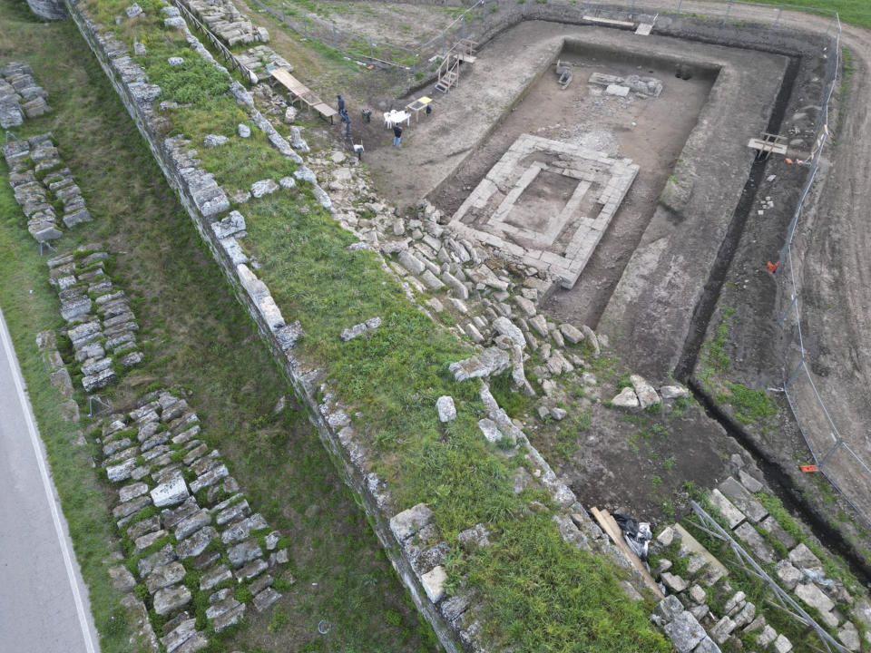 This undated photo shows the area where a newly discovered sanctuary, which dates from the 5th century B.C., was first identified in 2019 along the ancient city walls of Paestum, Southern Italy. The excavations of the sanctuary in the ancient city of Paestum have unearthed seven terracotta bull heads and a figurine of Eros riding a dolphin that shines new light on the religious life and rituals of the ancient Greek city, culture ministry officials said Saturday, April 15, 2023. (Paestum Velia Archeological Park via AP)