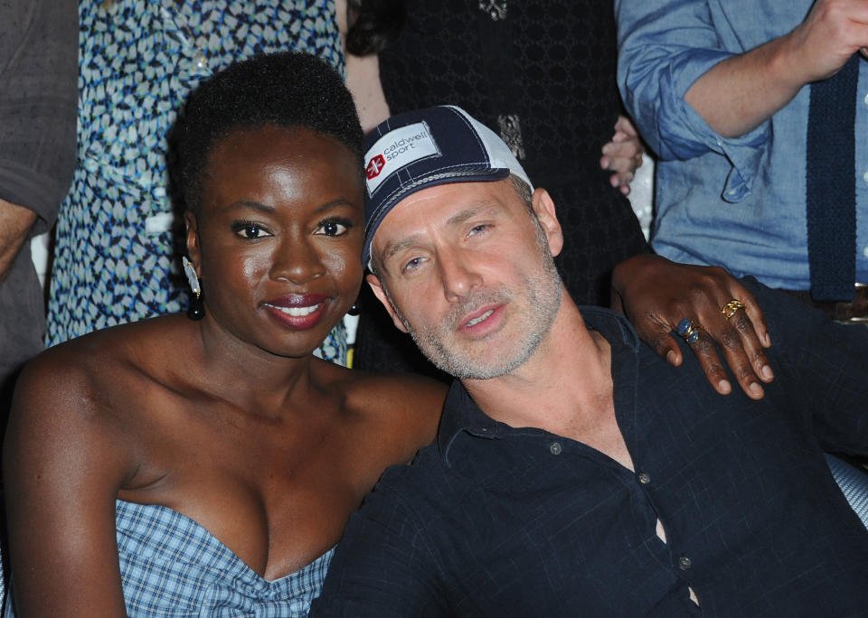 &nbsp;Danai Gurira and Andrew Lincoln&nbsp;hugging it out at&nbsp;SDCC. (Photo: Albert L. Ortega via Getty Images)