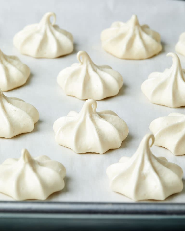 meringue cookies on a sheet pan