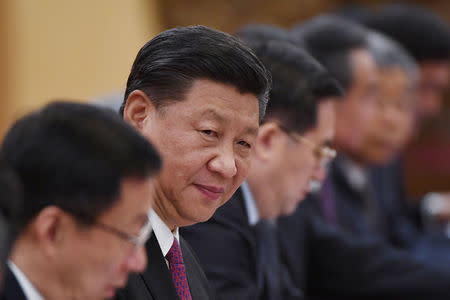 Chinese President Xi Jinping looks on during a meeting with Russian President Vladimir Putin (not seen) in the Great Hall of the People in Beijing, China June 8, 2018. Greg Baker/ Pool via REUTERS