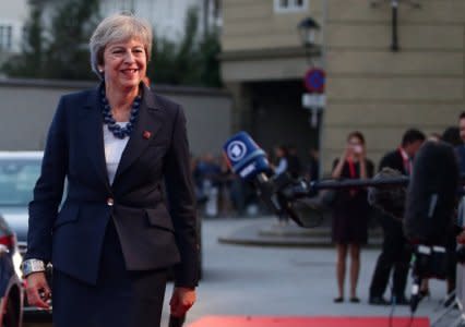 Britain's Prime Minister Theresa May talks to the media as she arrives for the informal meeting of European Union leaders ahead of the EU summit, in Salzburg, Austria, September 19, 2018. REUTERS/Lisi Niesner