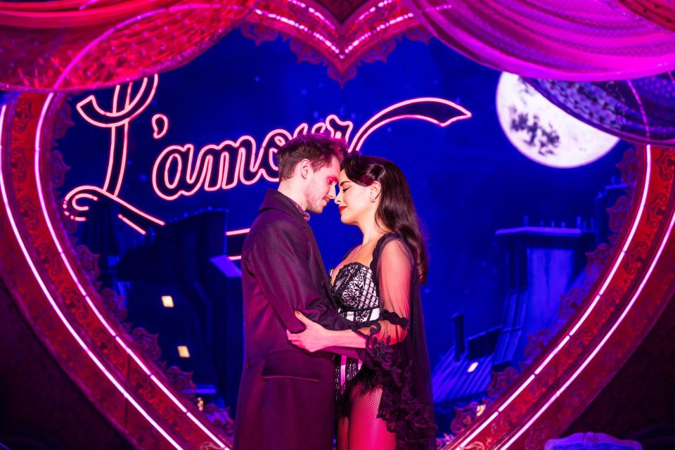 John Cardoza and Courtney Reed star as Christian and Satine In the North American tour of "Moulin Rouge."