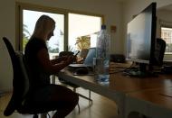 Olga Paul, a 34-year-old from Germany, works remotely from Las Palmas De Gran Canaria