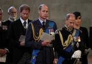 <p>Britain's William, Prince of Wales, Prince Edward, Prince Harry and Meghan, Duchess of Sussex, react as the coffin of Britain's Queen Elizabeth arrives at Westminster Hall from Buckingham Palace for her lying in state, in London, Britain, September 14, 2022. REUTERS/Alkis Konstantinidis/Pool</p> 