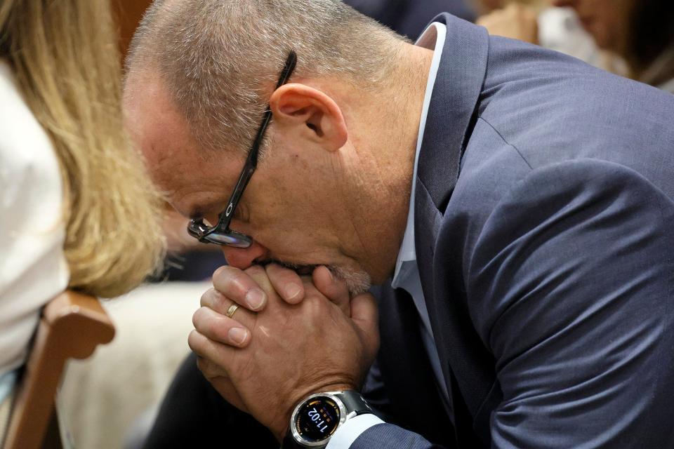 In this photo Oct. 13, 2022, Fred Guttenberg, whose daughter, Jaime, was killed in the 2018 shootings, awaits a verdict in the trial of Marjory Stoneman Douglas High School shooter Nikolas Cruz at the Broward County Courthouse in Fort Lauderdale.  Cruz, who plead guilty to 17 counts of premeditated murder in the 2018 shootings, is the most lethal mass shooter to stand trial in the U.S. He was previously sentenced to 17 consecutive life sentences without the possibility of parole for 17 additional counts of attempted murder for the students he injured that day. Cruz was sentence to life in prison.