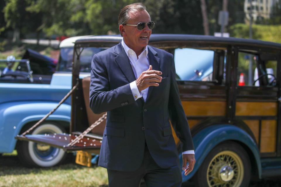 Rick Caruso campaigns at a car show