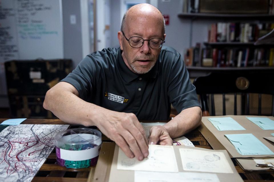 George S. Robb Centre Director Timothy Westcott sorts through letters and other artifacts on Oct. 8, 2021, at Park University, in Parkville, Missouri.