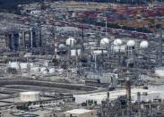 The Phillips 66 refinery is viewed from the air in Carson, California August 5, 2015. REUTERS/Mike Blake