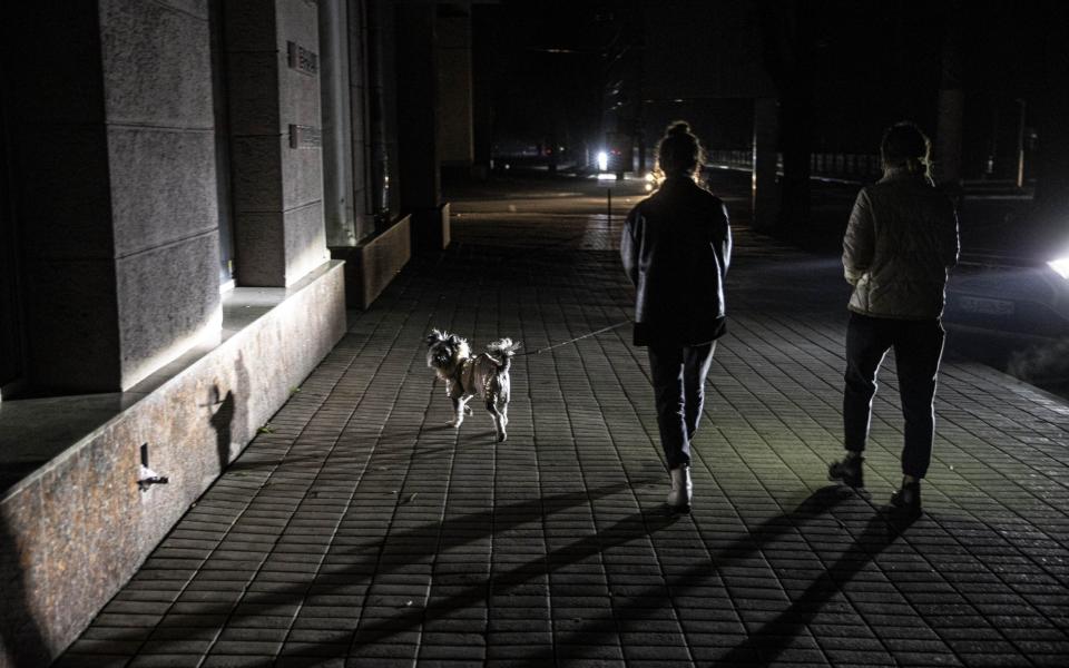 Views of the city in dark during power cuts due to the war in Dnipro - Metin Aktas/Anadolu Agency via Getty Images